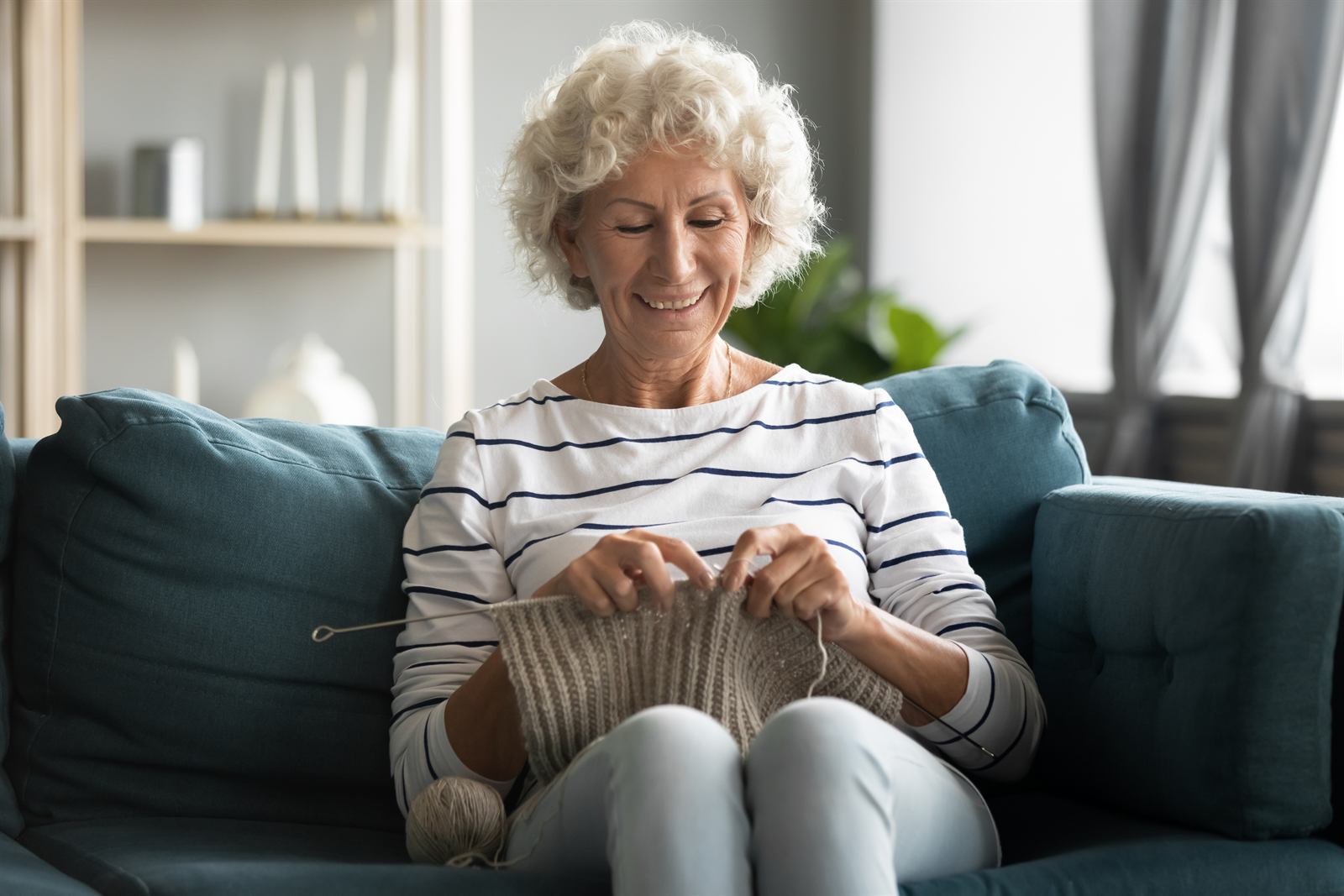 A health plan member at home, where an in-home collection would reach her